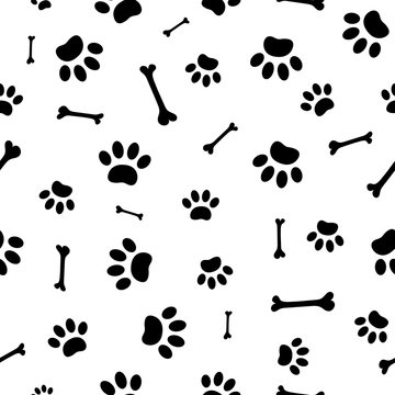 Seamless pattern of black paw prints dog and bones vector design.
