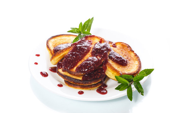 sweet pancakes with raspberry jam
