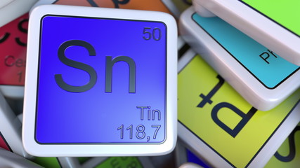 Tin Sn block on the pile of periodic table of the chemical elements blocks. Chemistry related 3D rendering