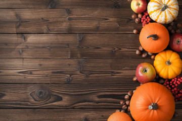 Autumn harvest on wooden table - obrazy, fototapety, plakaty