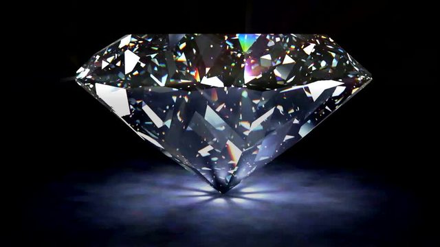 spinning diamond isolated on black background.