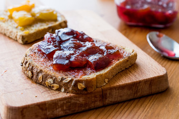Damson Plum Jam on bread with Apricot jam