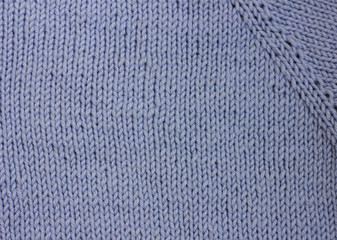 Blue light knitted wool background