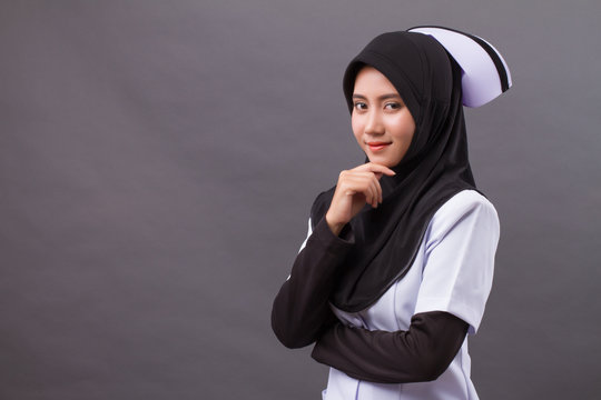 Smart, Confident Muslim Nurse Thinking, Planning