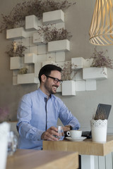 Using laptop at the coffee shop