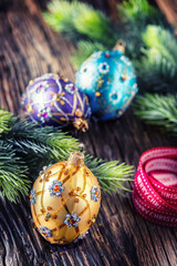 Fototapeta na wymiar Christmas Time. Luxury golden purple blue christmas ball and decoration.Red ribbon with text happy christmas