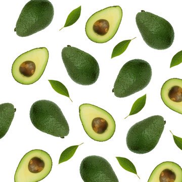 Seamless pattern with avocado and leaves on white background. Whole and half avocado with leaves.Food concept.