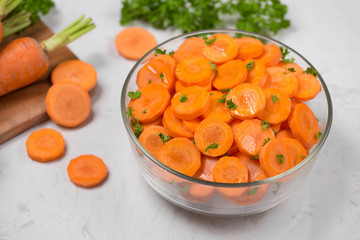 Chopped carrot slices. Fresh raw peeled carrot slice in bowl.