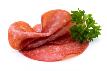 Salami slices isolated on white background.