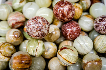 Green and brown balls made from onyx stone.