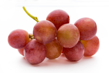 Ripe red grape isolated on white.