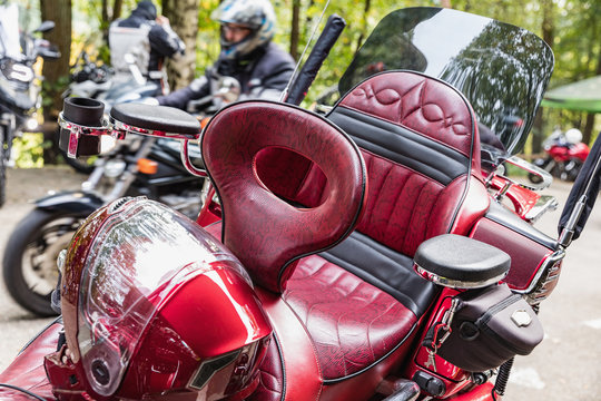 Detail of the red leather luxury motorbike seat.