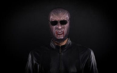 Obraz premium man in a terrible mask, the concept of halloween