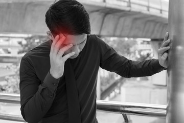 sick businessman suffering from stress, headache, vertigo, migraine, emotional problem