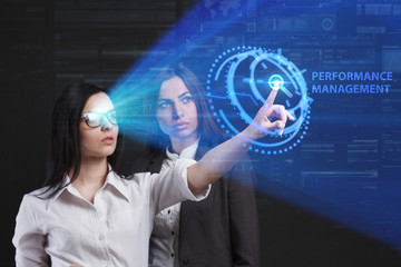The concept of business, technology, the Internet and the network. A team of business women working on the virtual screen of the future and see the inscription: Performance management