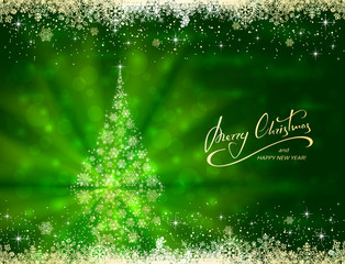 Shiny golden Christmas tree from snowflakes on green background