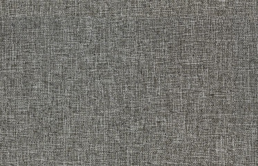 Fototapeta na wymiar Texture of gray fabric from polyester