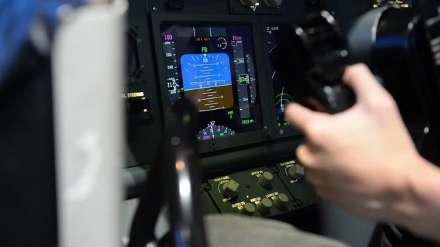Cockpit display panel while aircraft turn left and right