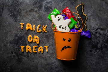 Halloween concept - basket with candies