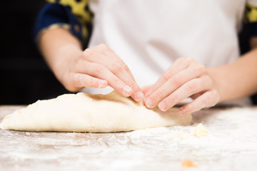 Production of flour products. Hands close up
