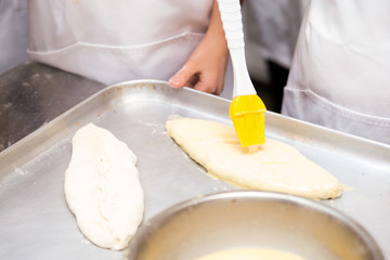 Production of flour products. Hands close up