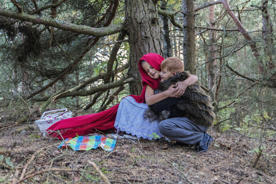 Children play in the Little Red Riding Hood and the wolf