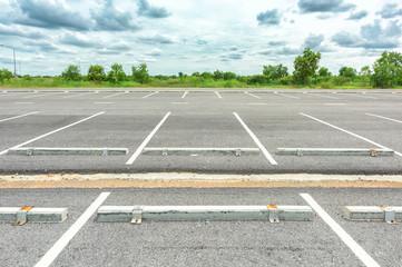 Empty parking lot against a beautiful blue sky