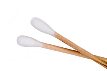 Cottoned sticks on a white background seen close up