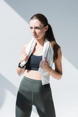 Naklejka premium athletic woman with towel