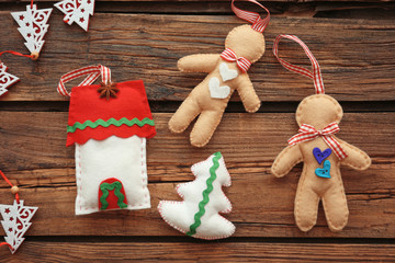 Christmas composition with soft toys on wooden background