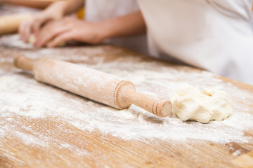 Production of flour products. Hands close up