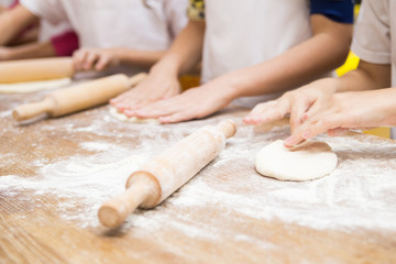 Production of flour products. Hands close up