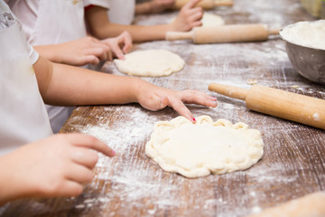 Production of flour products. Hands close up