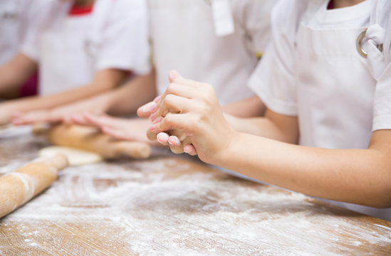Production of flour products. Hands close up