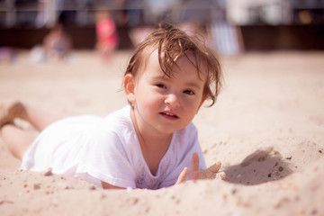 Girl and sunny day near sea