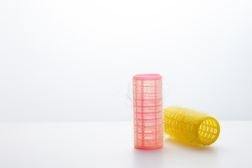 Set of hair curlers isolated on white background