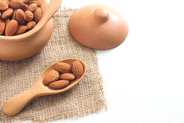 Almond seeds in a clay pot