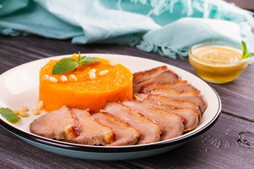 Duck breast with mashed pumpkin (or butternut squash) and honey mustard sauce, horizontal