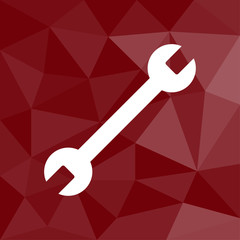 Schraubenschlüssel - Reparieren - Icon mit geometrischem Hintergrund rot