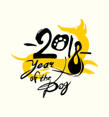 Year of the Dog. 2018. Handwritten template with the inscription and silhouette of a yellow dog. Imitation of painting with brush and ink. Symbol of the year on the Chinese calendar. 

