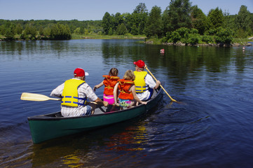 Family starting  canoe ride