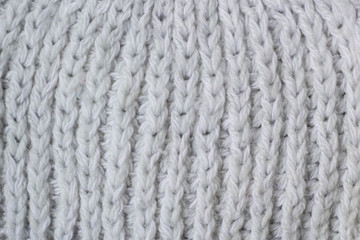 Sweater or scarf Pattern Of White Knitted Fabric Texture Background