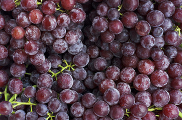 Close up of Fresh Red grape fruits backgrounds above