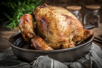 Roasted chicken on plate.