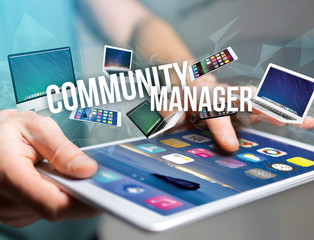 Community manager title surounded by device like smartphone, tablet or laptop - Internet and communication concept