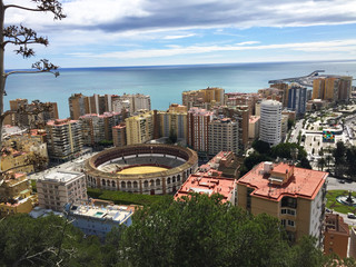 Obraz premium panoramic view of the malaga city and of the bullfighting arena