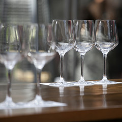 the empty glasses on the table for a banquet