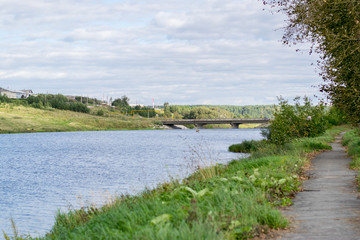 House on water at the Urals, Russian traditional village river landscape