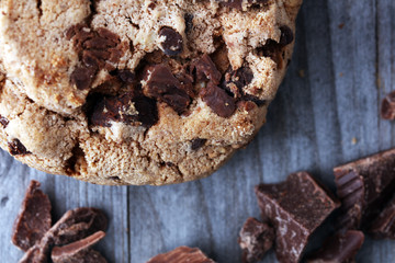 Chocolate cookies on wooden table. Chocolate chip cookies shot.