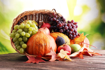 Autumn nature concept. Fall fruit and vegetables on wood. Thanksgiving dinner.